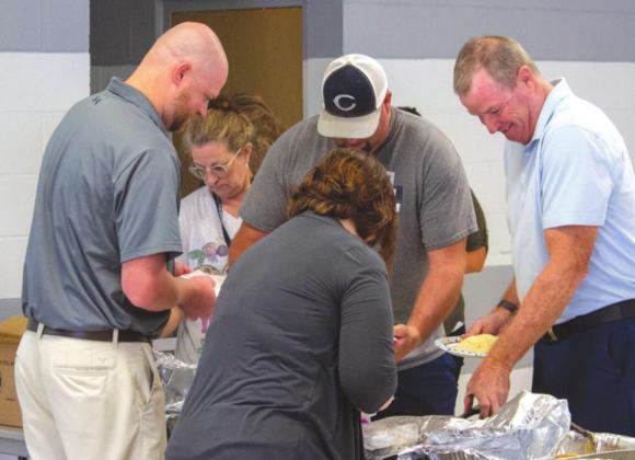Superintendent Brad Overton getting ready to enjoy his meal. PHOTO BY HECTOR LUCAS
