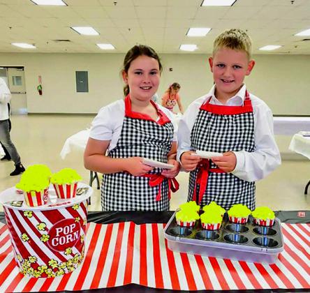 Denton Cook and Delainee Moore created these popcorn masterpieces during the Washita County 4-H Cupcake Wars. RIGHT: .Examples of the cupcakes designed and created by the contestants. CONTRIBUTED PHOTOS