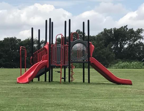 The new play structure will provide hours of fun for community children. Its modern design is made to be safer than older equipment.