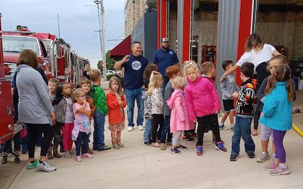 Cordell Elementary students get ready to make their way into the Cordel Fire Department. PHOTO BY HEATHER FLORES