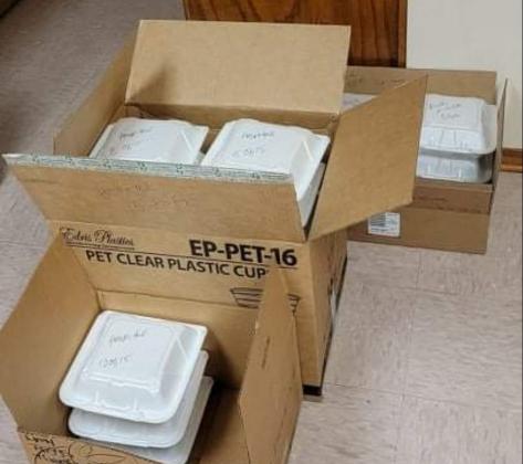 To-Go Meals are packed and ready to deliver at the Community Thanksgiving held at the 4th and College Church of Christ. CONTRIBUTED PHOTO