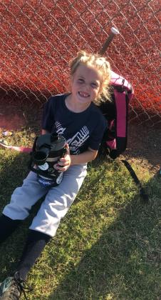 Sloane Roberts is happiest when playing softball.