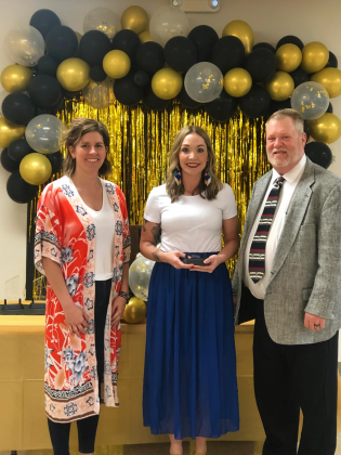 Alyssa Wedel, owner of Slice 183 Pizza, was presented with the Business of the Year award