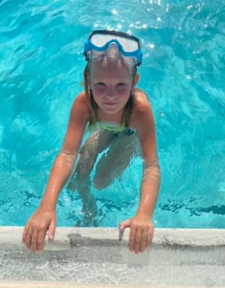 Journee Cooper enjoys a fun day at the pool! Photo by Stephanie Brown