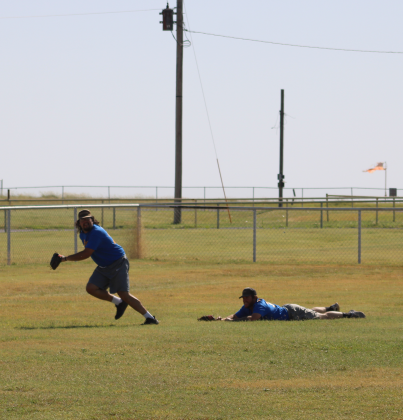 Dalton Ball misses a hit to the outfield. Photo by Brooklynn Peek