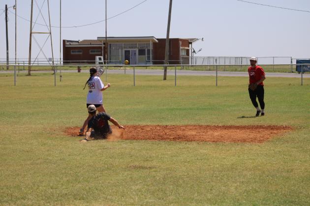 Jayton Bryant slides safe into second base. Photo by Brooklynn Peek
