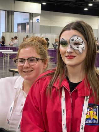 Cassandra (Casey) Parker is pictured with her model, Kylie Powers, during the SkillsUSA competition in which she created a special effects Cruella de Vil inspired makeup look