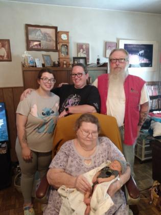Five generations included Gladys Pool (center) and her great-great grandchild Graesyn Sylvester, Graesyn’s mom Kayley Sylvester (left), Kaylee’s mom Holley Dunn (top center), and Holley’s Dad Bud Wess (right)