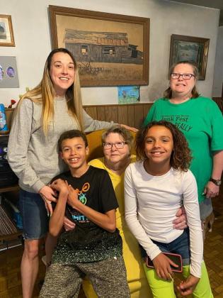 Four generations included Gladys Pool (center) and her granddaughter (upper left) Shonda Washington, Shonda’s mom (upper right) Frances Sand, and Shonda’s children Brandon and Jada Washington