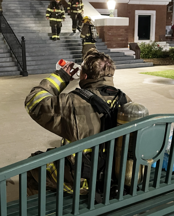 Corn Fireman Asa Zoschke hydrating. Photo by Brooklynn Peek