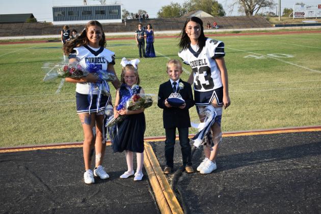 Miniature attendants were Camber Holland and Tobias Victory escorted by Tavianna Collins and Katlyn Melzer