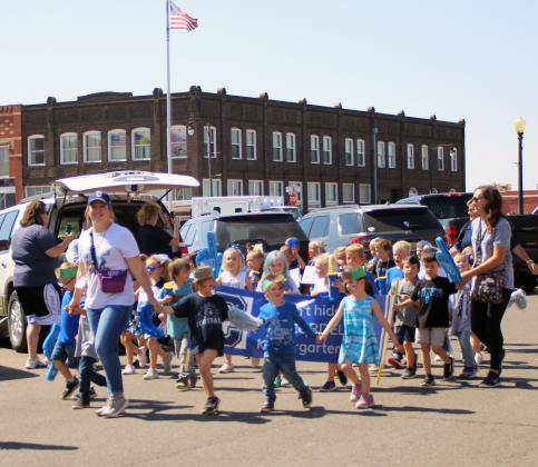 Mrs. Trammell leading her students through the parade
