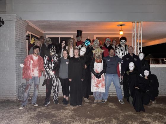 Haunted Morgue crew poses for a group photo on Halloween night.
