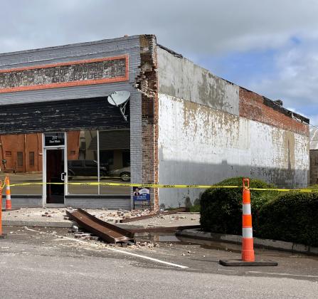 A building for sale next to the Opera House sustained damage to the side following the collapse of an attached steel beam. Photo by Brooklynn Peek