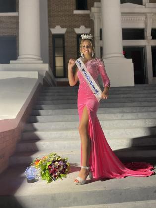 Miss Washita County Fair Taylor Sullivan poses on the Washita County Courthouse steps. Photo by Patsy Sullivan