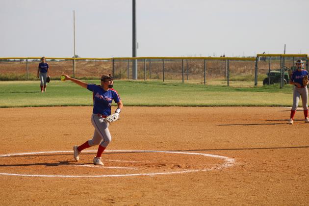 Brooklyn Weaver throws a pitch during their game against the Sentinel Bulldogs.