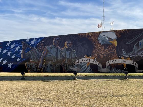 Wind turbine blade mural painted with a patriotic theme honoring Veterans