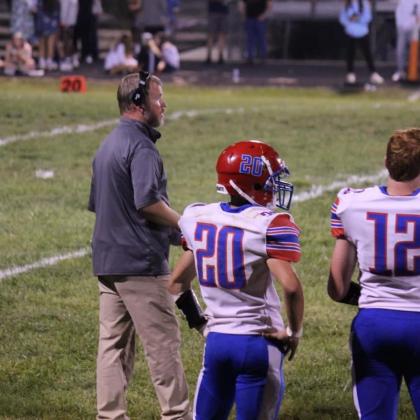Coach Munden alongside some of his previous players