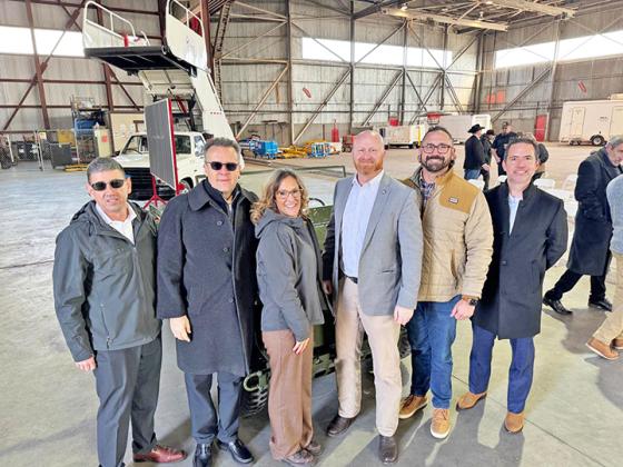 Attendees at the recent unveiling of the restored Marine One helicopter included (left to right) PAC Accountable Manager Jose Gonzalez, PAC Owner Fransisco Lona, PAC Office Manager Sumer Jones, Sen. Brent Howard, Rep. Nick Archer, and PAC owner Hector Ovalle. CONTRIBUTED PHOTO