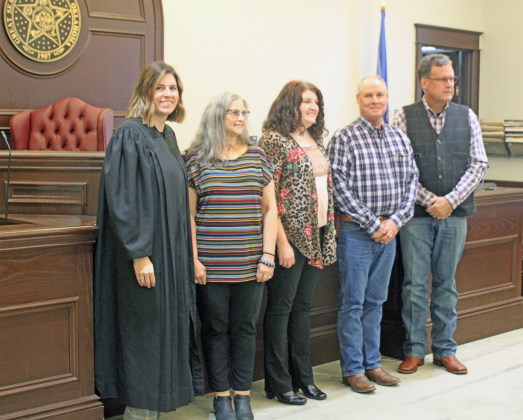 From left: Judge Gatlin, Washita County Court Clerk Lynda Vermillion, Washita County Clerk Kristen Dowell, Washita County District 2 Commissioner David Gray, and Washita County Sheriff Kevin Rozell. Photo by Heather Benavidez.