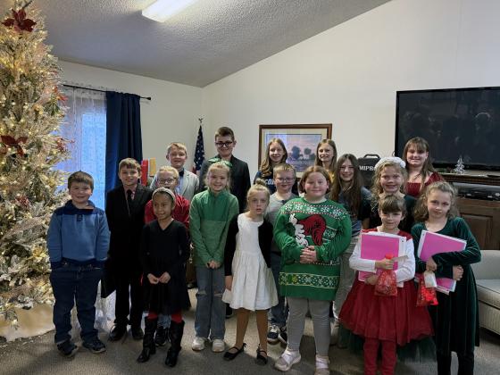 Students from left to right (front row) Benaiah Miller, Adelyn Lonebear, Leah Victory, Presley Proffitt, Jaelynn Simmons, Abby Marshall, Lily Marshall, (Second Row) James Marshall, Dawson Pool, Josiah Miller, Natalie Celsor, Elsie Jaronek, (Back Row) Nate Victory, Parker Vandever, Elliana Yaeger, Lea Marshall, Harper Penn.