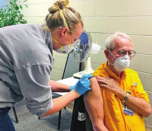 Dr. Bob Abernathy receives the first dose of the COVID-19 vaccine in Washita County. CONTRIBUTED PHOTO