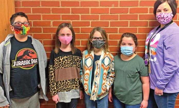 Cordell second-graders from left: Saxon Flores, Addelin Meget, Kimber Feltman and Cambree Moorex, stand with teacher Blaire Wall.