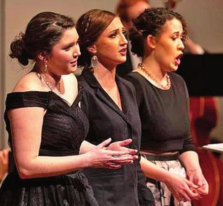 Elizabeth Edge, left, sings during a performance. COURTESY PHOTO