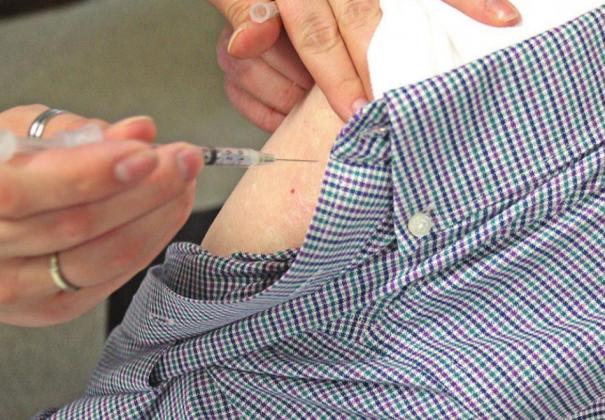Dennis Dawson, interim director at Baptist Village, receives a COVID-19 vaccination. PHOTO BY THOMAS R. MARTINEZ