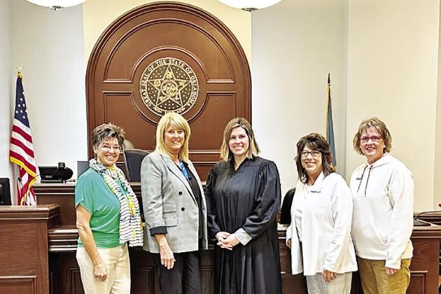 CONTRIBUTED PHOTO Julie Strong (President of CASA of Western Oklahoma Board of Directors), Laurie Crall (CASA), Honorable Judge Brooke Gatlin, Jackie Aaron (Executive Director, CASA of Western Oklahoma). Tamra Misak (Training/ Recruitment, CASA of Western Oklahoma).