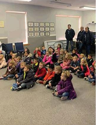 Students listen during a fire safety presentation. Photo courtesy of Jason Dudgeon.