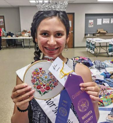 BAILEY GOSSEN WITH HER WINNING FLORAL HEART EMBROIDERY AT THE WASHITA CO. FAIR