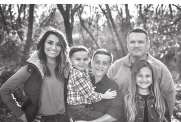 Newly named Cordell Elementary School Principal Mike Higgins and his family. CONTRIBUTED PHOTO