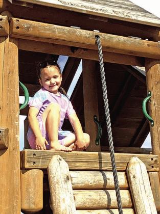 Clara Huntzinger, Cordell, enjoys the play area at “The Corn Patch” following the June 7th recital.