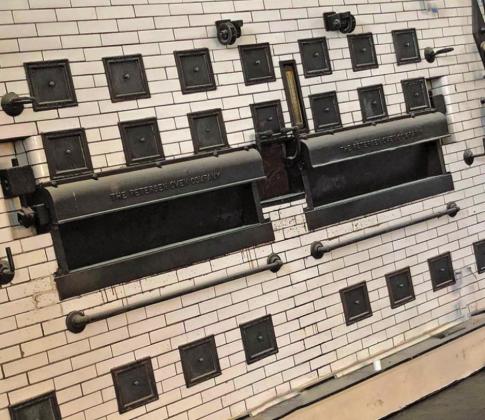100 years ago the building which will house Slice 183 was constructed as a bakery. This is the original brick oven used in Cline’s Bakery, and it is featured prominently in the décor of the pizzeria.