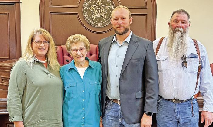 Rusty Bookout, center, with his parents Shelley and Mark Bookout and his Grandmother Bonnie Bookout