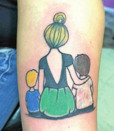 A tattoo of a mother and two children that Rachel Jones put on the arm of a customer. CONTRIBUTED PHOTO