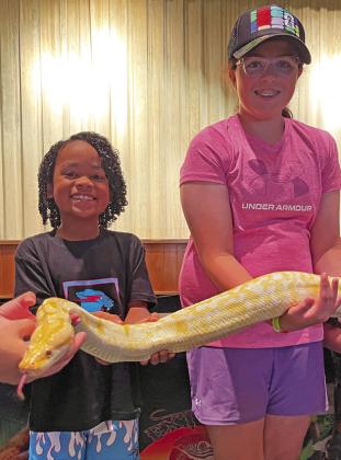 IMRE JORDAN AND ELLIE HOLMAN WITH BANANA