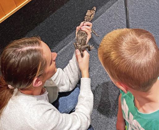 KAITLYN EVANS &amp; MALACHI MILLER WITH CHOMPERS THE CAIMAN