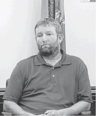 Lee Nurnberg, owner of Nurnberg Roofing LLC, testifies in court Jan. 7, 2020. Bob Henline | The Cordell Beacon