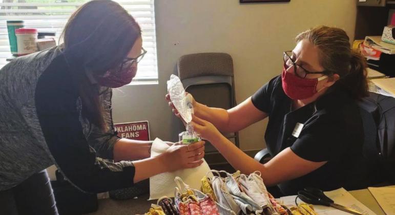 Staff wearing protective gear work at an eastern Oklahoma nursing home.(Photo provided)