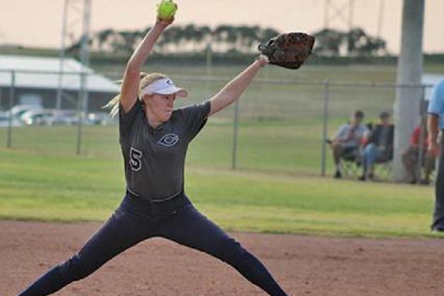Senior Pitcher Andrea Palmer hurls the ball.