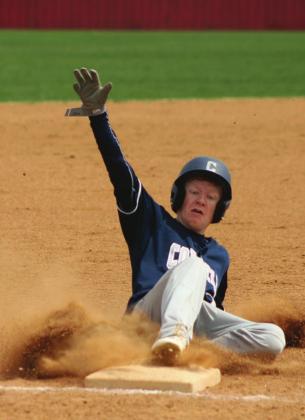 Cordell junior Brady Reimer slides into third at Cache, third place in the Oklahoma Press Association sports photography category.