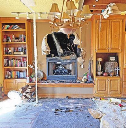 CORDELL HOME HEAVILY DAMAGED BY CHIMNEY FIRE