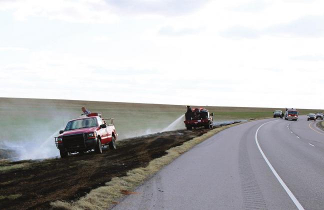 Cordell fire crews mop up a one-acre grass fire north of Cordell Feb. 25. Bob Henline I The Cordell Beacon