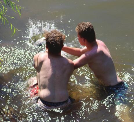 James Ivy, left, and Aidyn Henline and the one that got away. Bob Henline | Cordell Beacon
