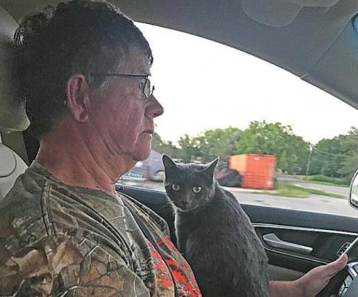 Karri Burch and her cat, Midnight.