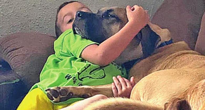 Odin Leon and his dog, Loki.