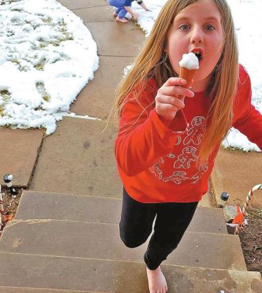 Kenam Trent poses with a “real” snow cone.
