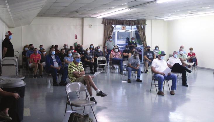 Residents Pack Room To Defend EMS